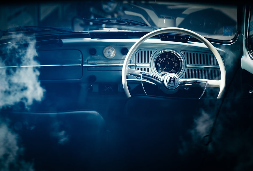 Vintage Car Interior with Smoke and Blue Lighting