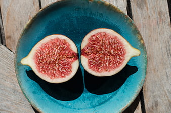 Fresh Cut Figs on Blue Ceramic Plate