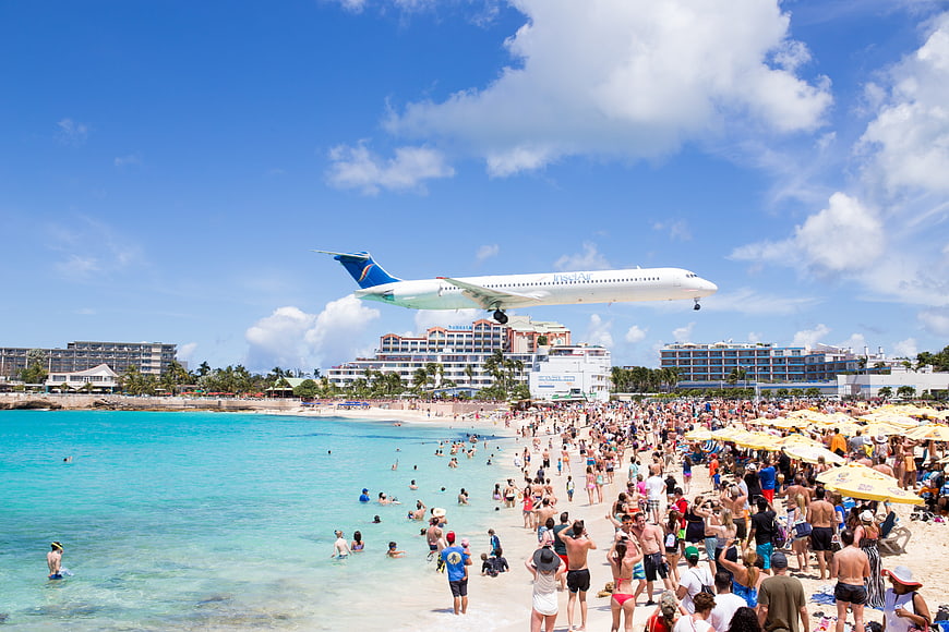 Airplane Landing Over Crowded Maho Beach in Saint Martin