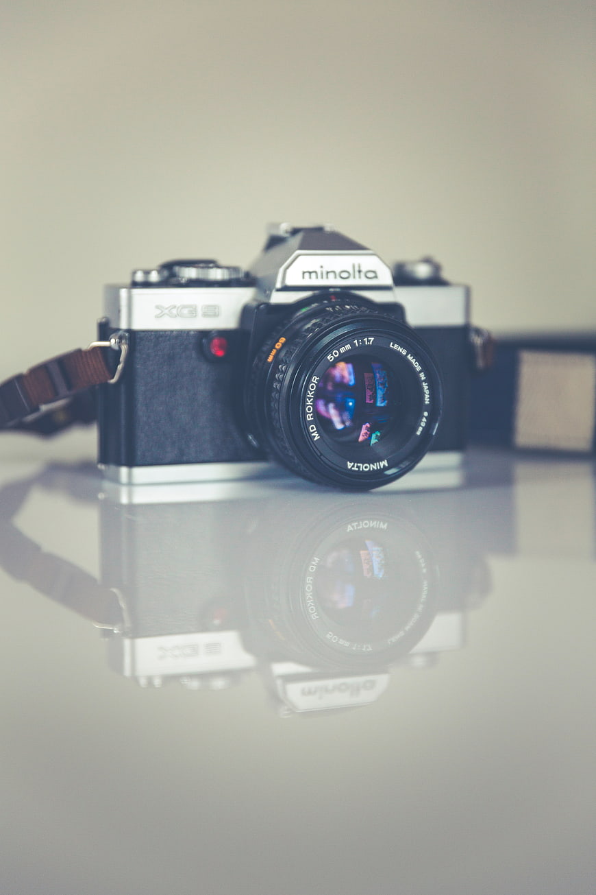 Vintage Minolta XG-3 Film Camera with Reflection