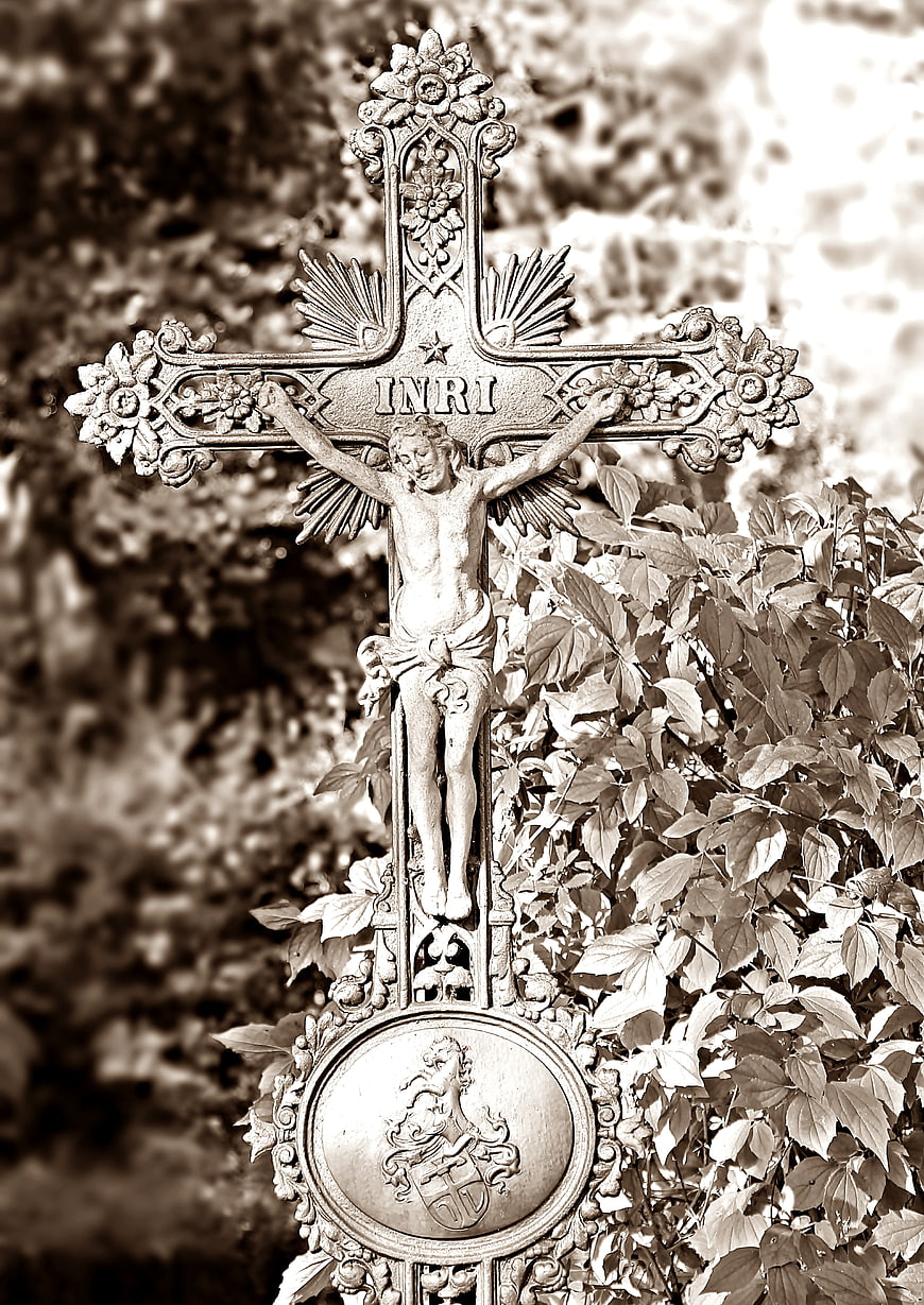 Sepia Toned Ornate Iron Crucifix in Cemetery