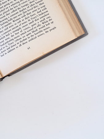 Open Vintage Book Page on White Background with Copyspace
