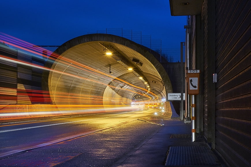 Long Exposure Light Trails in a Tunnel at Night