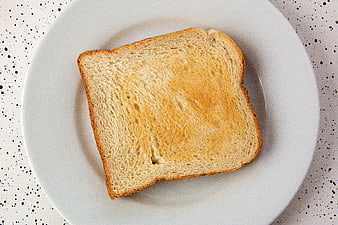 Top View of Toasted White Bread on White Plate
