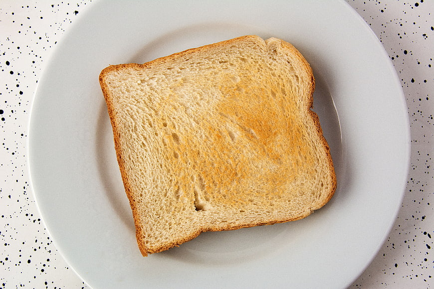 Top View of Toasted White Bread on White Plate