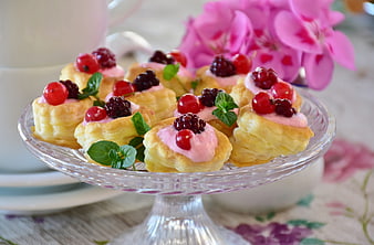 Puff Pastry Berry Tarts With Cream On Glass Cake Stand