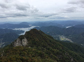 Panoramic Mountain Ridge Overlooking Lake and Valley