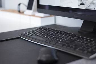 Modern Office Workspace with Keyboard and Monitor