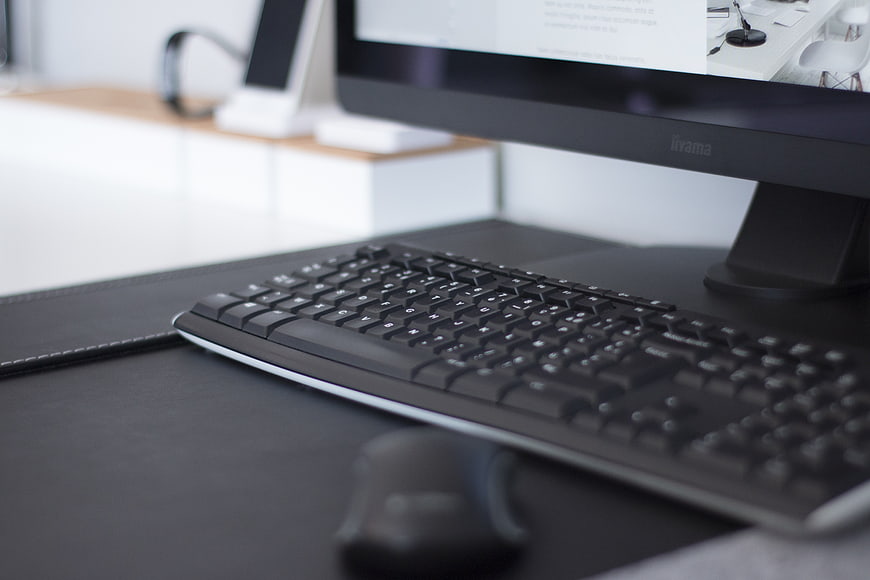 Modern Office Workspace with Keyboard and Monitor
