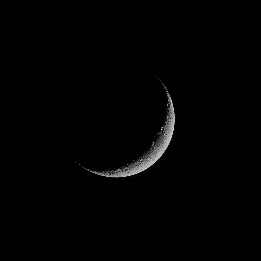 Crescent Moon in Black Night Sky