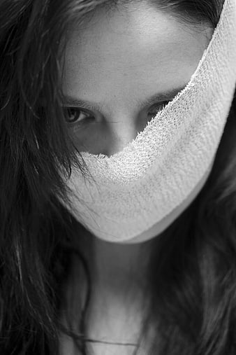 Close-up of Woman with Bandaged Face in Black and White