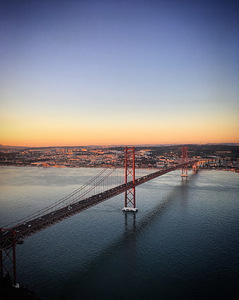 Aerial View of 25 de April Bridge at Sunset in Lisbon