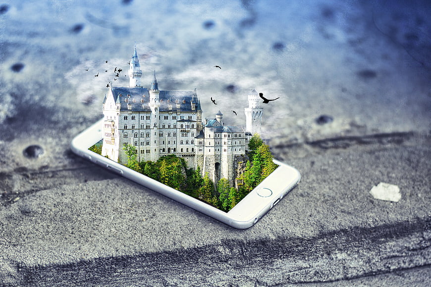 Neuschwanstein Castle Emerging from Smartphone Screen