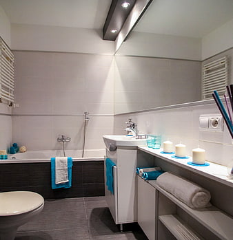 Modern Bathroom Interior With White Tiles And Blue Accents