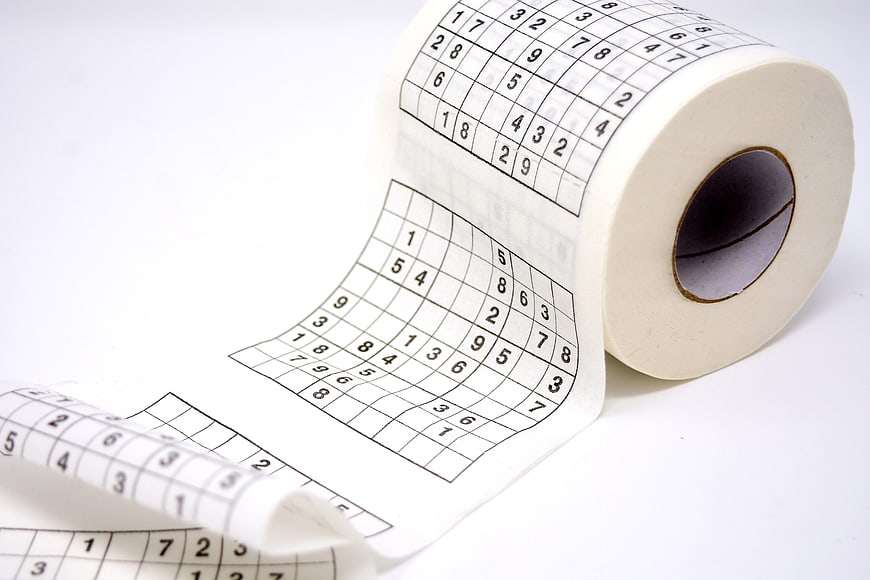 Sudoku puzzles printed on a roll of toilet paper