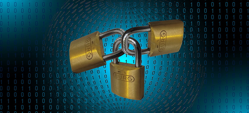 Three Brass Padlocks Interlocked Against Binary Code Background