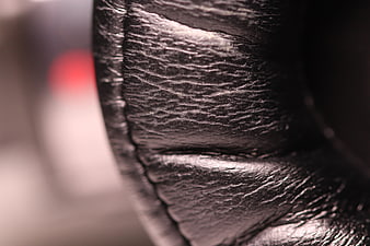 Close-up of black leather headphone ear cup texture