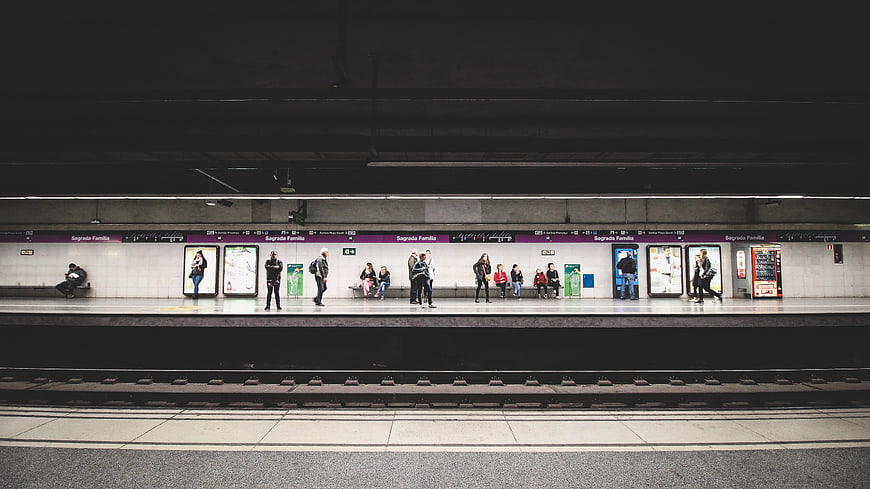 Passengers waiting at Sagrada Familia subway station platform