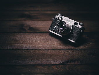 Vintage FED-2 Camera on Dark Wood Background