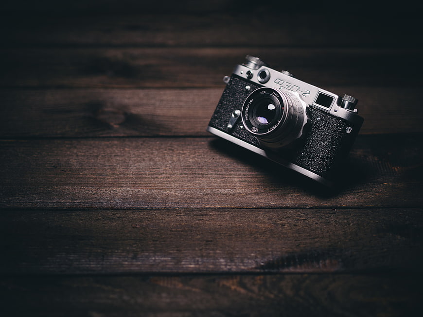 Vintage FED-2 Camera on Dark Wood Background