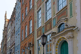 Colorful historic European townhouses with ornate facades