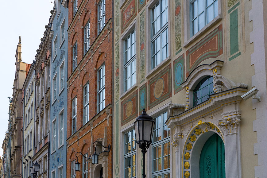 Colorful historic European townhouses with ornate facades
