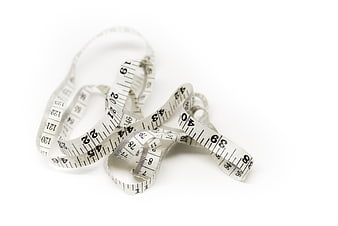 White Measuring Tape on White Background