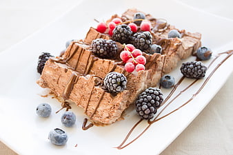 Chocolate Mousse Dessert with Berries and Chocolate Drizzle