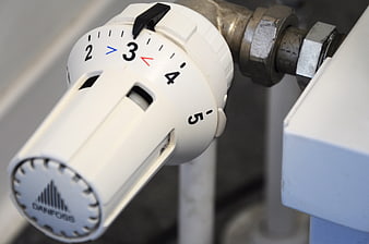 Close-up of Danfoss radiator thermostat valve setting