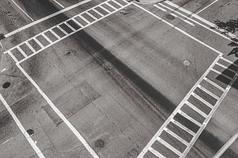 Aerial View of Empty Street Intersection with Crosswalks