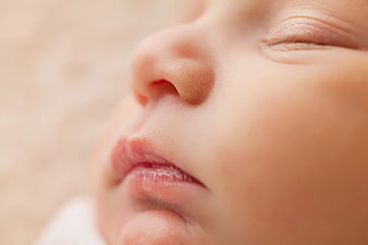 Close-up of sleeping baby's nose and lips