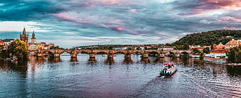 Charles Bridge and Vltava River in Prague at Dusk