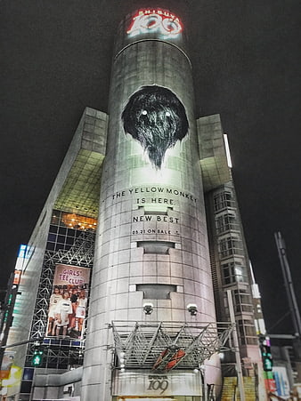 Shibuya 109 Tower Night View with Yellow Monkey Billboard