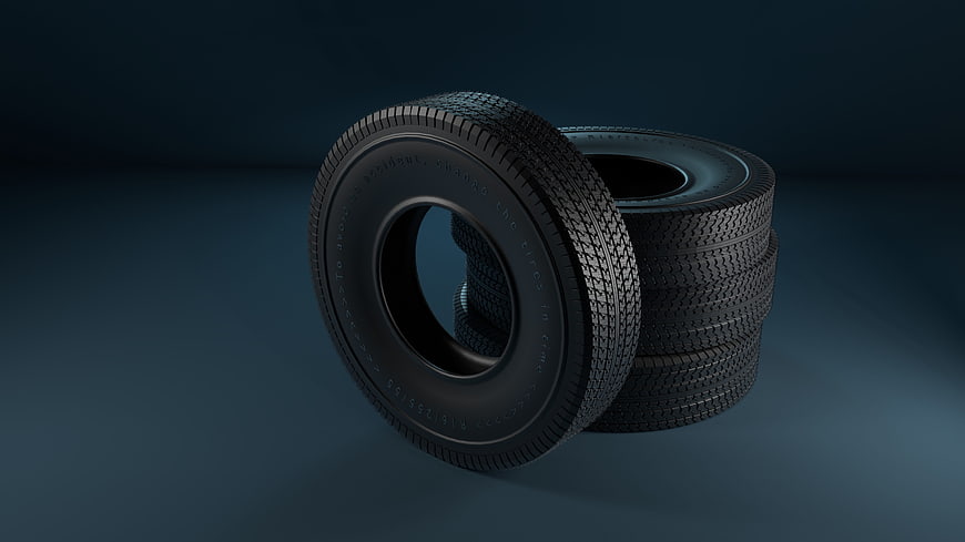 3D Render of Car Tires on Dark Blue Background