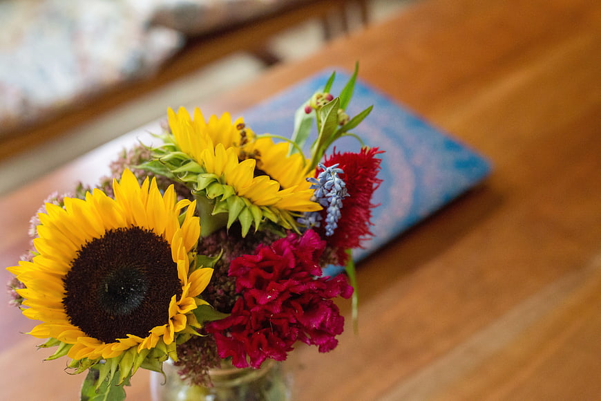 Colorful Sunflower Bouquet on Wooden Table