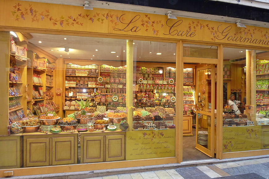 French Gourmet Shop Facade with Chocolates and Sweets