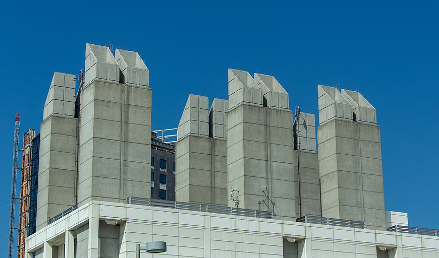Concrete Ventilation Shafts on Modern Building Rooftop