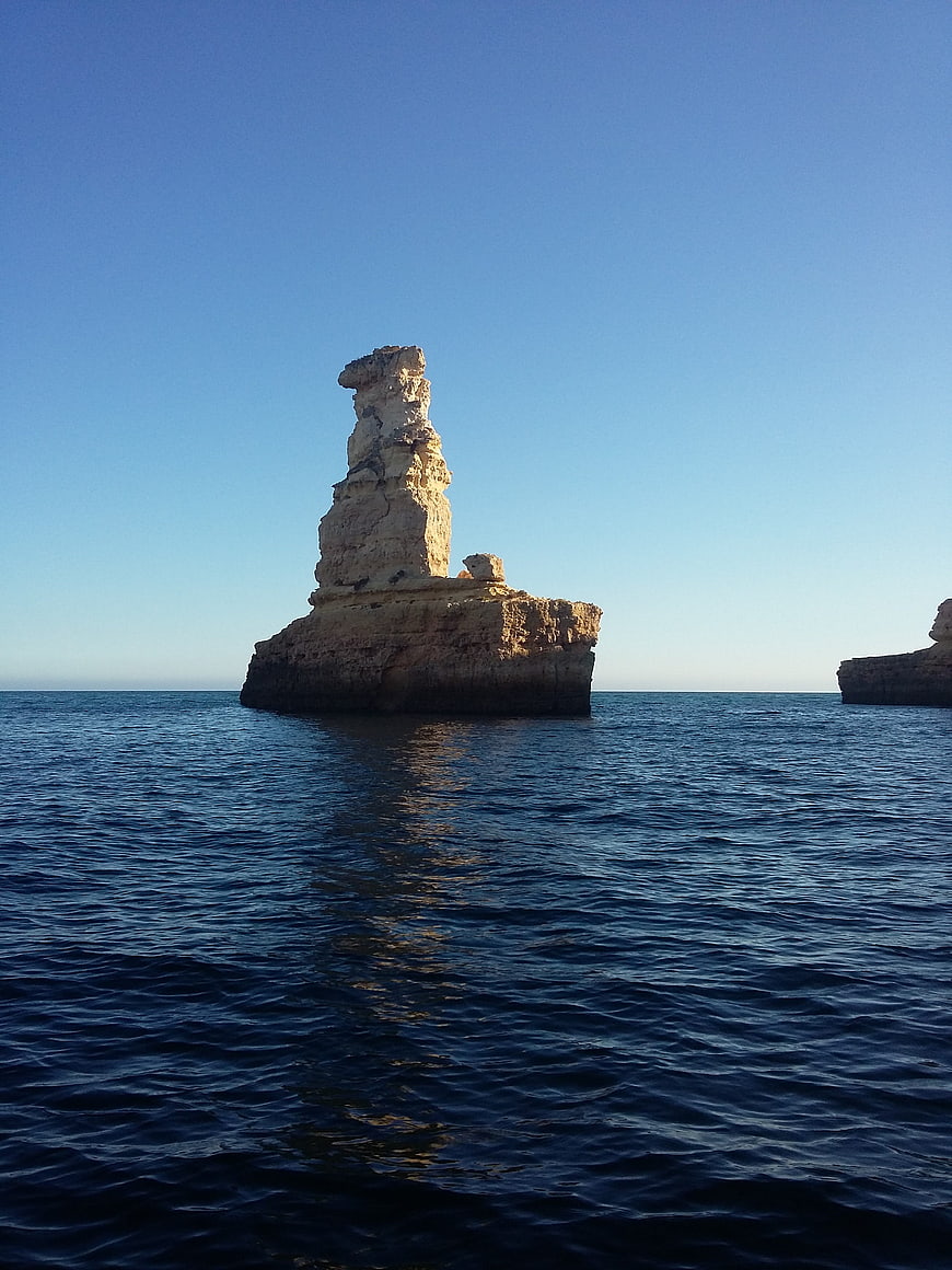 Sea Stack Rock Formation in Blue Ocean Water