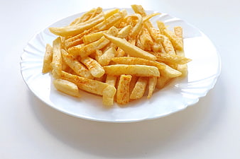 Seasoned French Fries on White Plate
