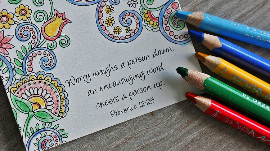 Handwritten Proverbs 12:25 Quote on Decorated Paper with Colored Pencils