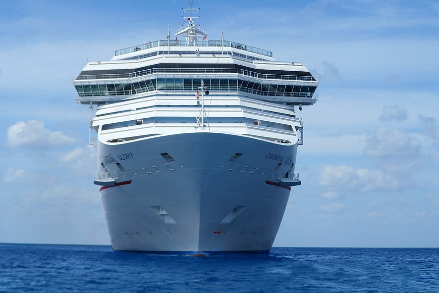 Front view of Carnival Glory cruise ship on blue ocean