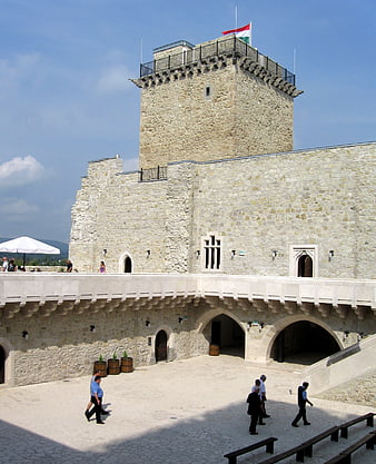 Visegrad Castle Courtyard with Tower and Hungarian Flag