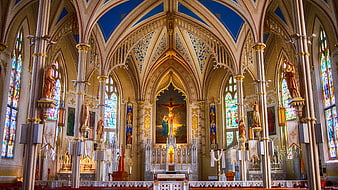 Interior of Gothic Cathedral with Stained Glass and Altar