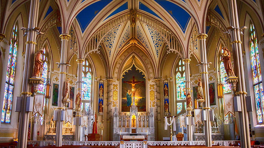 Interior of Gothic Cathedral with Stained Glass and Altar