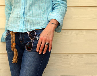 Casual Fashion Detail with Jeans, Sunglasses, and Tassel Belt