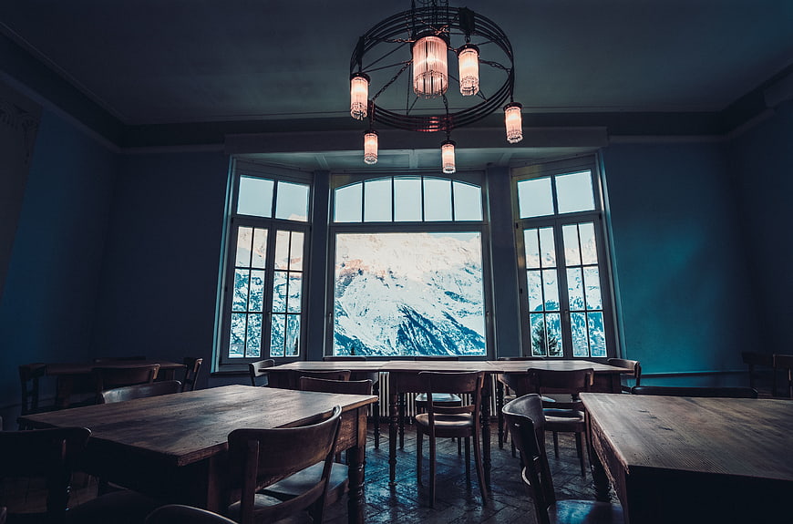 Empty rustic dining room with mountain view