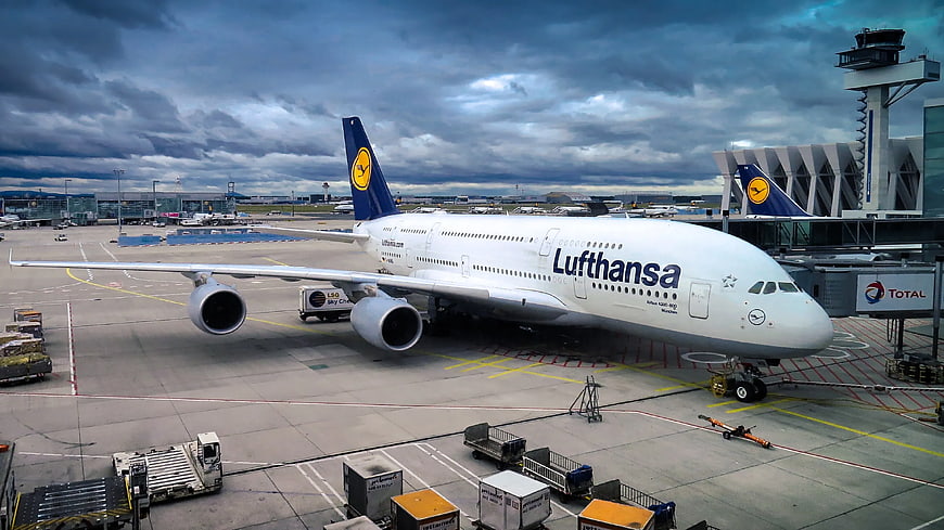 Lufthansa Airbus A380 parked at airport terminal
