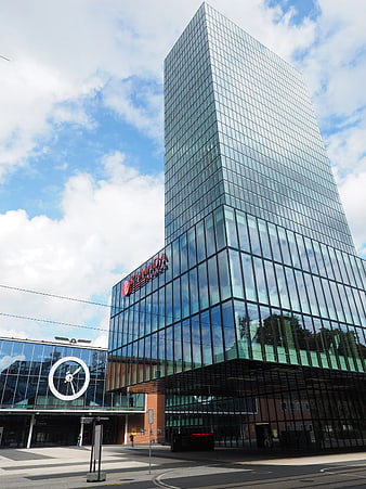 Modern Glass Skyscraper with Ramada Plaza Sign