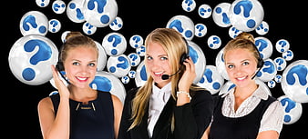 Three female customer service representatives with headsets and question marks