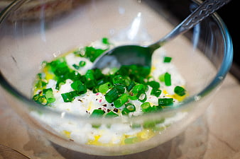 Glass Bowl With Yogurt, Chives, And Spoon